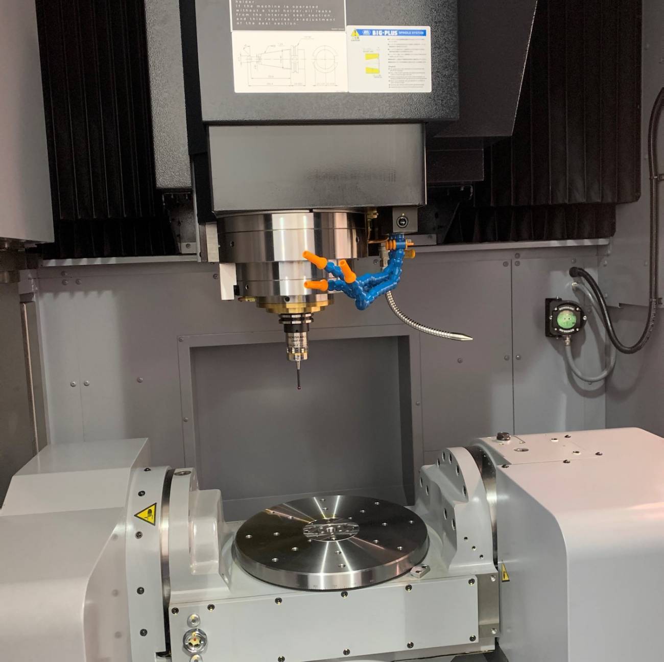 spindle and table inside the VC-X350 machining center sold by Methods Machine Tools