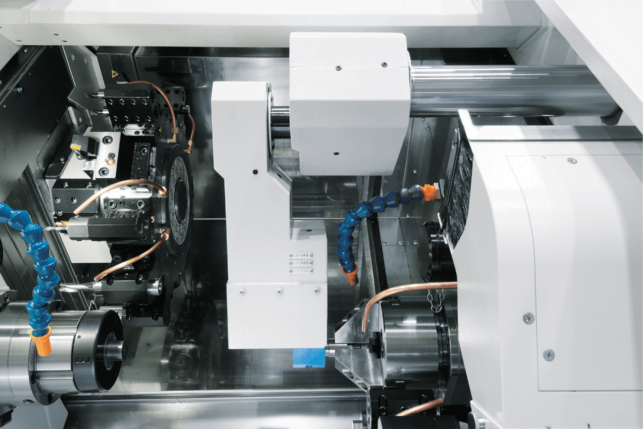 parts and machinery inside the Nakamura-Tome WT-150II turning center