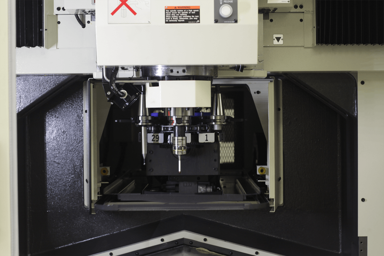 open inside photo of the Yasda YBM 950V Jig Borer used for cnc machining