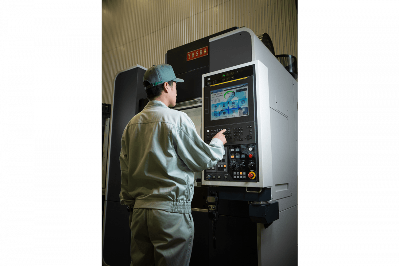 a CNC engineer operating the Yasda YMC-650 Micro Center